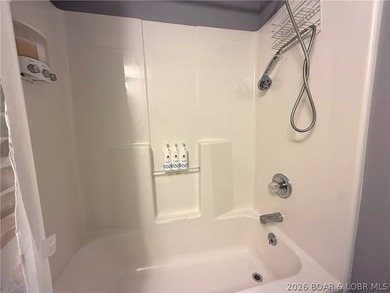 Lake life just got a serious glow-up! This beautifully remodeled - photo 38