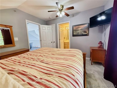Lake life just got a serious glow-up! This beautifully remodeled - photo 50
