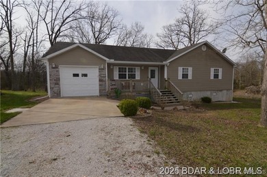 Welcome to your dream home in Gravois Mills! This delightful - photo 2