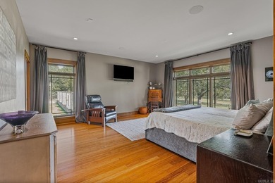 Set on 26 scenic acres, this stunning modern prairie-style home - photo 18