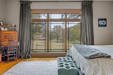 Set on 26 scenic acres, this stunning modern prairie-style home - photo 19