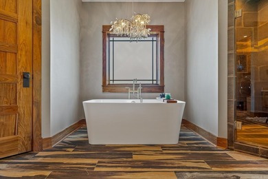 Set on 26 scenic acres, this stunning modern prairie-style home - photo 23