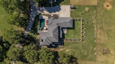 Set on 26 scenic acres, this stunning modern prairie-style home - photo 43