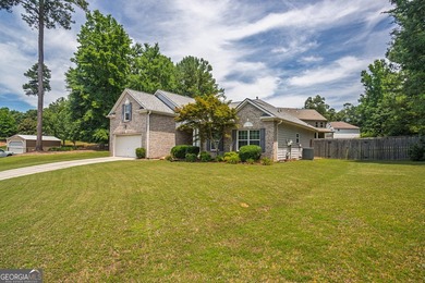 Welcome home to this beautifully maintained 4-bedroom, 2-bath - photo 2