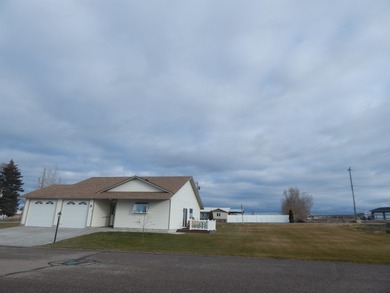 Easy living in this one level home in quiet 55+ community.This