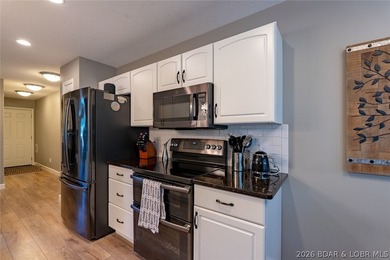 Located on a quiet cul-de-sac w/seasonal lake view in the highly - photo 11