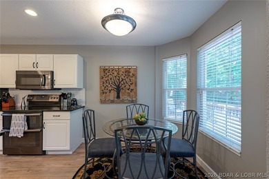 Located on a quiet cul-de-sac w/seasonal lake view in the highly - photo 12