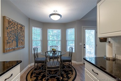 Located on a quiet cul-de-sac w/seasonal lake view in the highly - photo 13