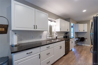 Located on a quiet cul-de-sac w/seasonal lake view in the highly - photo 14