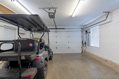 Located on a quiet cul-de-sac w/seasonal lake view in the highly - photo 18