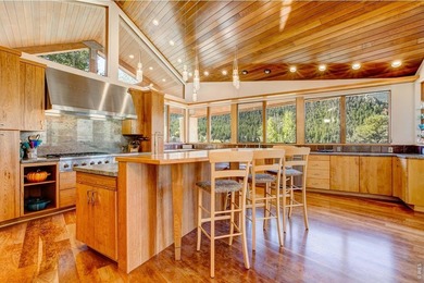 Perched in a peaceful, private setting with sweeping views of - photo 18