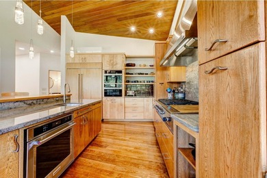 Perched in a peaceful, private setting with sweeping views of - photo 20