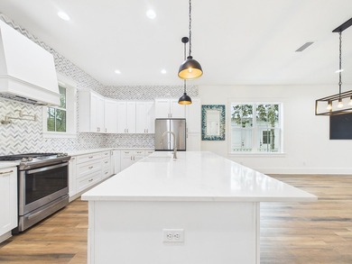 Discover coastal charm and modern luxury in this stunning Point - photo 21
