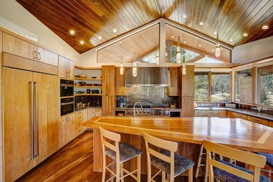 Perched in a peaceful, private setting with sweeping views of - photo 21