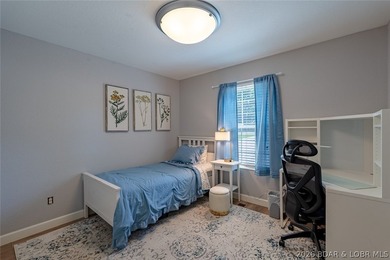 Located on a quiet cul-de-sac w/seasonal lake view in the highly - photo 26