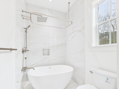 Discover coastal charm and modern luxury in this stunning Point - photo 26