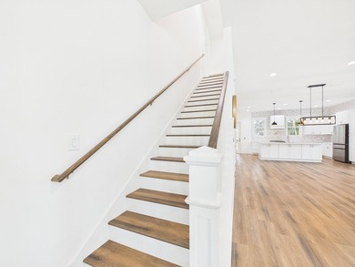 Discover coastal charm and modern luxury in this stunning Point - photo 29