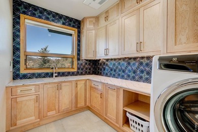 Perched in a peaceful, private setting with sweeping views of - photo 29