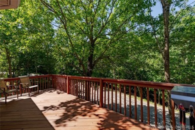 Located on a quiet cul-de-sac w/seasonal lake view in the highly - photo 31