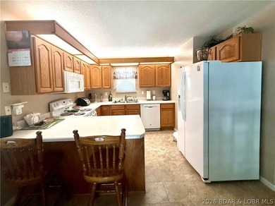 Hidden Gem Lakefront Home at the 3 MM! Nestled in a deep cove - photo 13