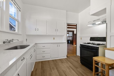 This beautifully preserved 1910 duplex blends timeless character - photo 13