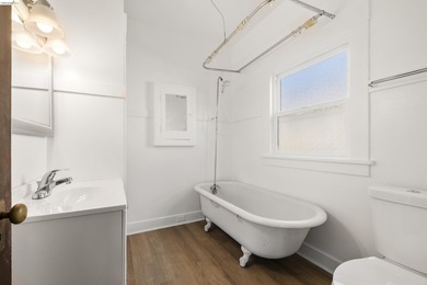 This beautifully preserved 1910 duplex blends timeless character - photo 15