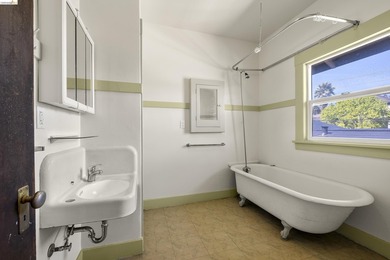 This beautifully preserved 1910 duplex blends timeless character - photo 26