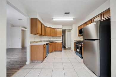 Welcome home to this exquisite three-bedroom, two-bathroom gem - photo 11