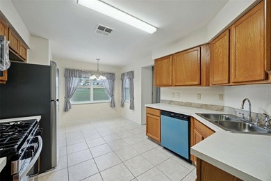 Welcome home to this exquisite three-bedroom, two-bathroom gem - photo 12
