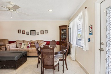 Corner, 2nd floor, walk up unit with a Balcony overlooking Water - photo 12
