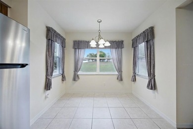 Welcome home to this exquisite three-bedroom, two-bathroom gem - photo 13