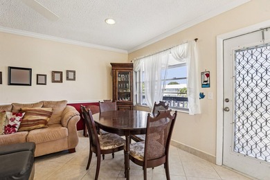 Corner, 2nd floor, walk up unit with a Balcony overlooking Water - photo 13