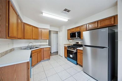 Welcome home to this exquisite three-bedroom, two-bathroom gem - photo 14