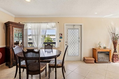 Corner, 2nd floor, walk up unit with a Balcony overlooking Water - photo 14