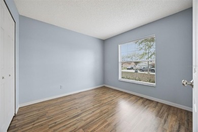 Welcome home to this exquisite three-bedroom, two-bathroom gem - photo 16
