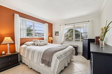 Corner, 2nd floor, walk up unit with a Balcony overlooking Water - photo 16