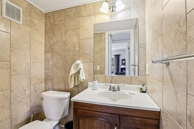 Corner, 2nd floor, walk up unit with a Balcony overlooking Water - photo 22