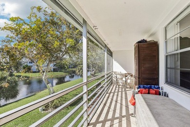 Corner, 2nd floor, walk up unit with a Balcony overlooking Water - photo 23