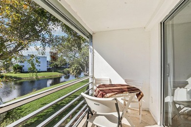 Corner, 2nd floor, walk up unit with a Balcony overlooking Water - photo 24
