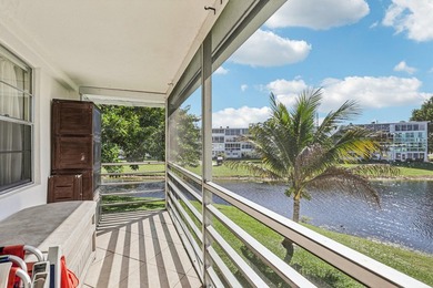 Corner, 2nd floor, walk up unit with a Balcony overlooking Water - photo 25