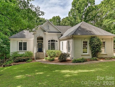 Custom-built home on 1.82 heavily wooded acres offering - photo 1