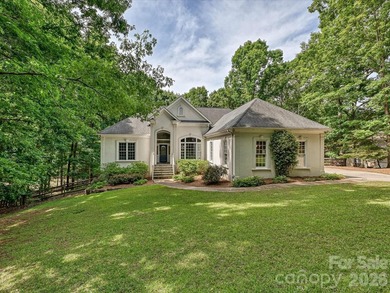 Custom-built home on 1.82 heavily wooded acres offering - photo 2