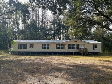 Lake Home For Sale in New Port Richey, Florida