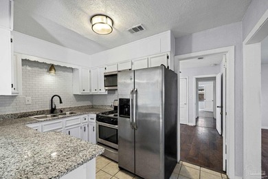 Experience the best of Pensacola living at 1631 E Hayes St, a - photo 8