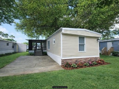 Live where others vacation at Bay Landings East, a pristine - photo 1