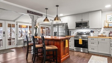 Price Improved to $599,500! Discover the perfect combination of - photo 8