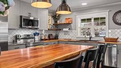 Price Improved to $599,500! Discover the perfect combination of - photo 10
