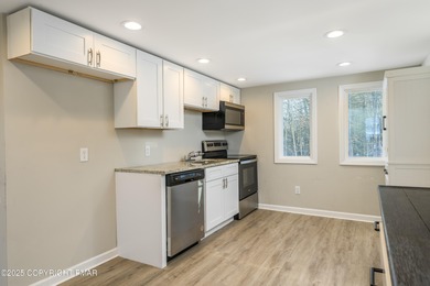 Welcome to this charming chalet style home offering 2 bedrooms