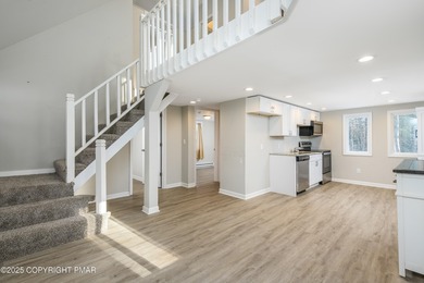 Welcome to this charming chalet style home offering 2 bedrooms