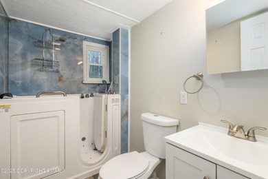 Welcome to this charming chalet style home offering 2 bedrooms